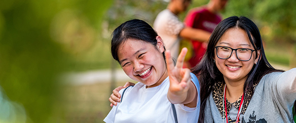 Two women international students at Rose-Hulman smile.